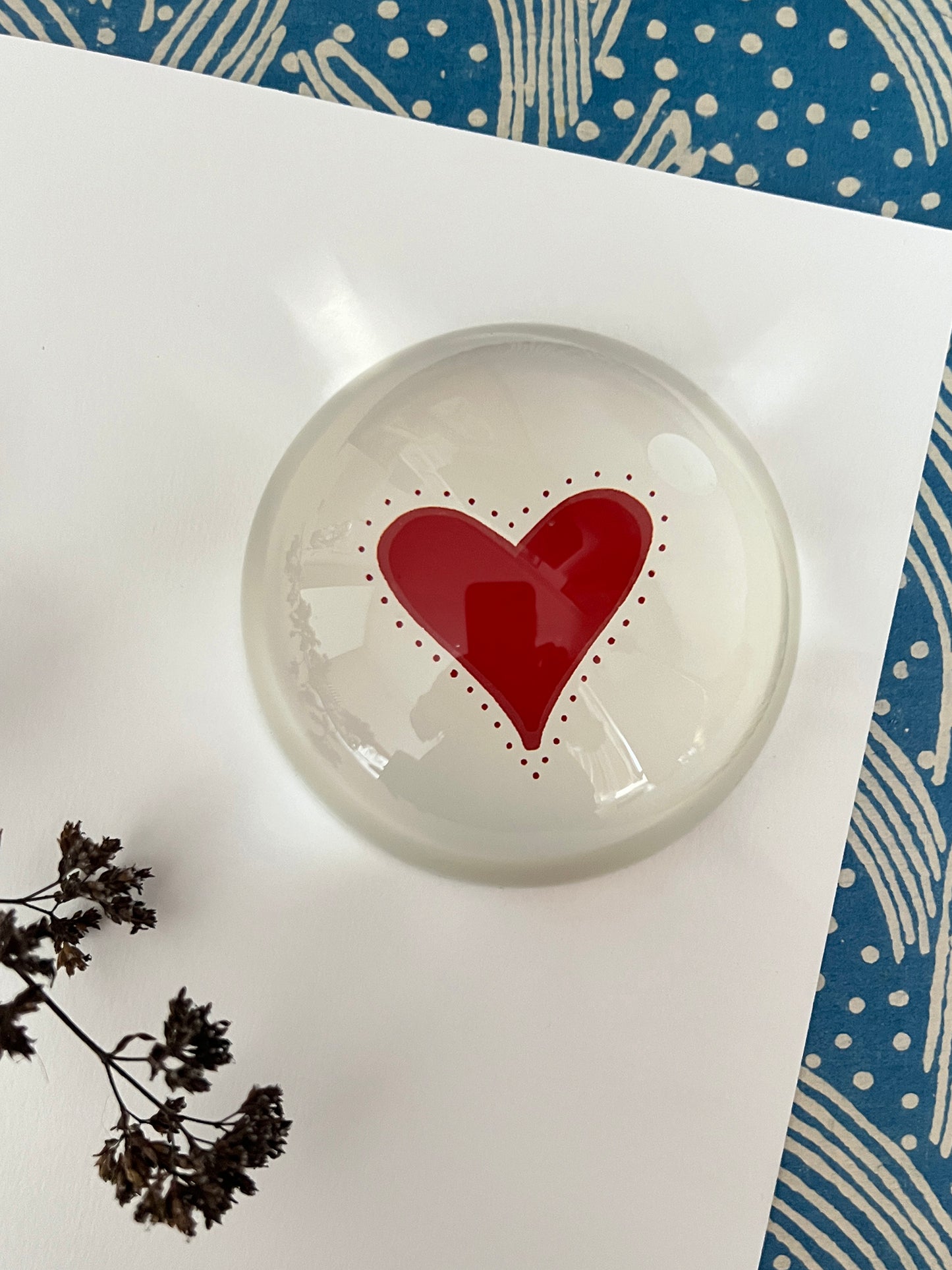 Decoupaged paperweight with a hand drawn heart by Lizzet Frausto