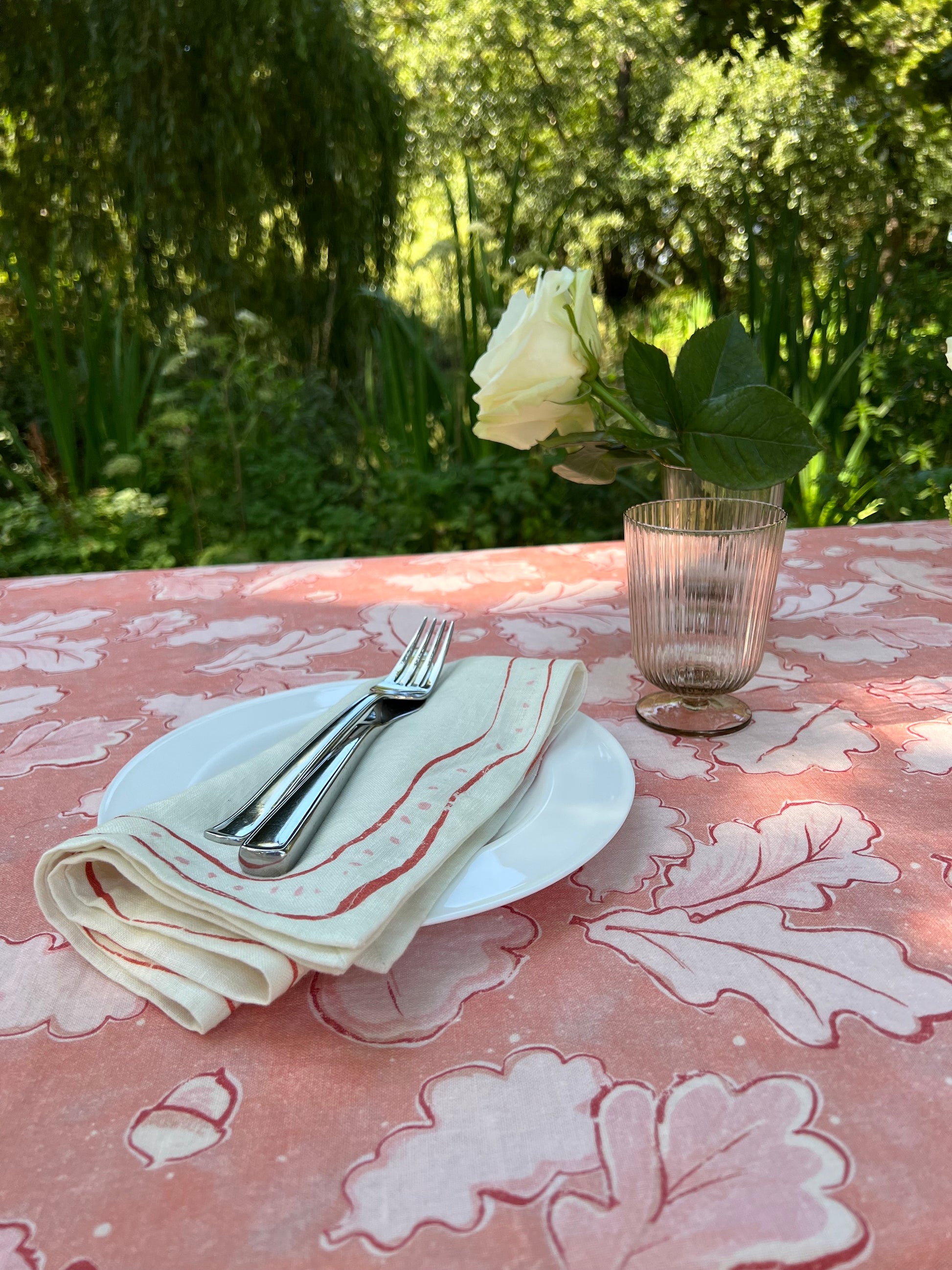 A set of four beautiful linen napkins, graceful and wavy lines napkins wrap around each napkin adding a delicate and timeless look.  They are the perfect addition to an elegant and graceful tablescape.  Shop beautiful table linen from Lizzet Frausto