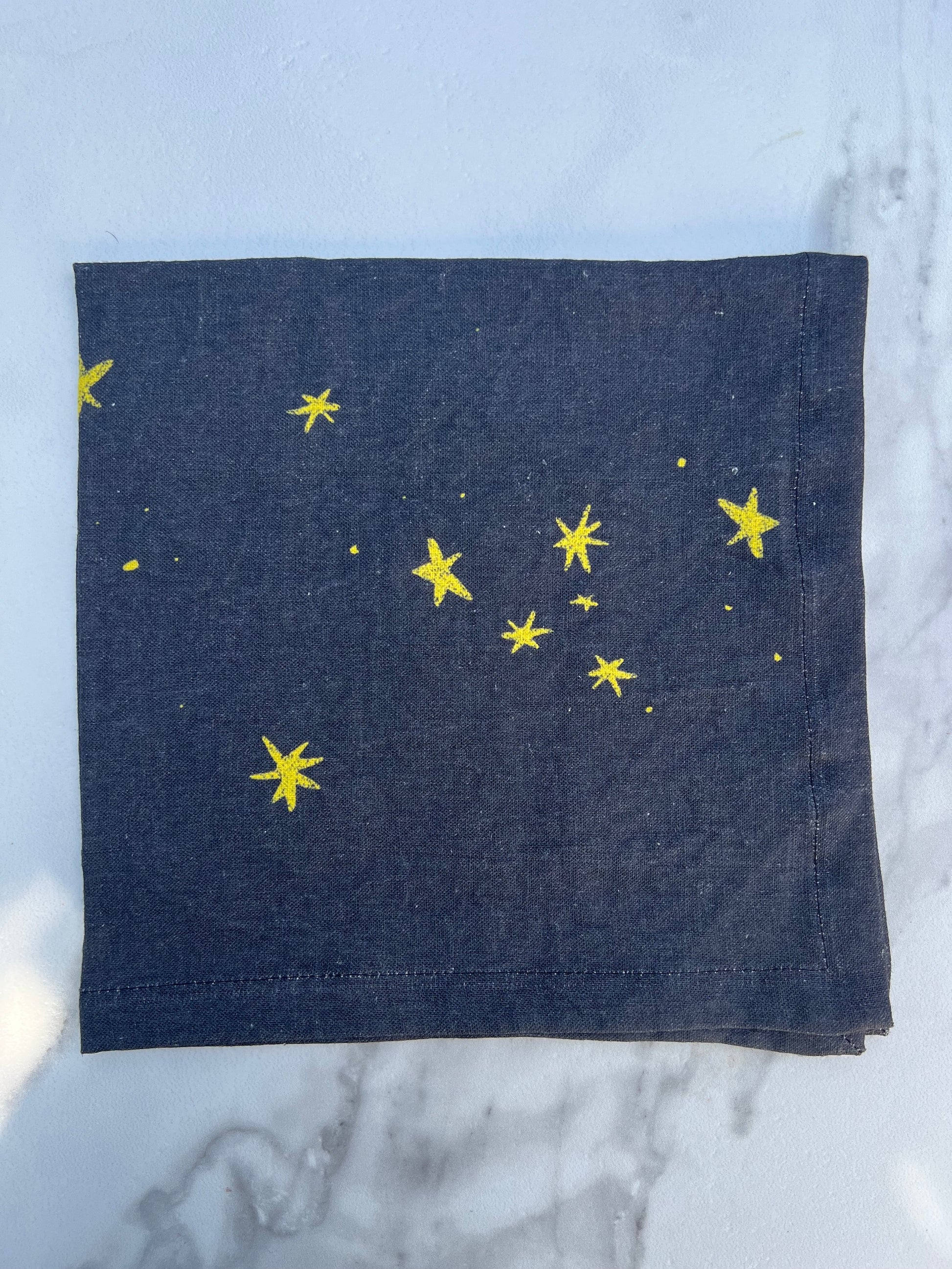 The simple and quiet joy of shining stars against the dark blue night sky.  Printed on pure linen, these napkins add a simple layer of radiance, and unequivocal joy to any table.  A perfect gift to yourself or your host/hostess.